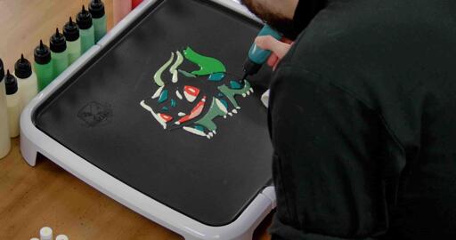 Bulbasaur pancake art step 5.3: Fill in bulbasaur's spots/markings with your deeper blue/blue-green batter.