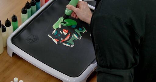 Bulbasaur pancake art step 6.1: Begin filling in the rest of bulbasaur's bulb with your middle green batter.