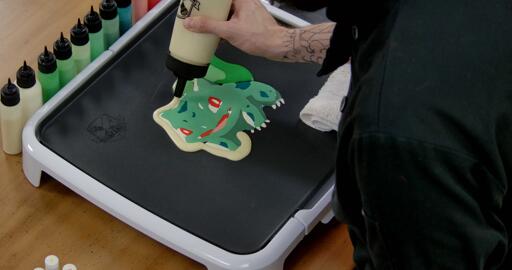 Bulbasaur pancake art step 7.1: Begin to outline your bulbasaur design with plain pancake batter.