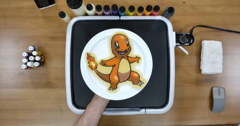 Charmander Pancake Art final step: Plate your Charmander pancake, and enjoy! Great work, everyone - you'll be the very best in no time at all!