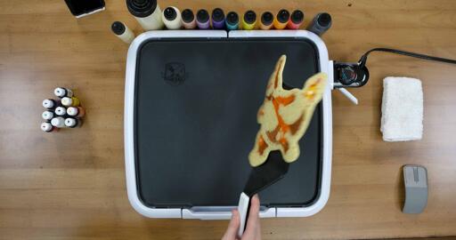 Charmander Pancake Art step 10.2: ...turn the pancake over all at once...