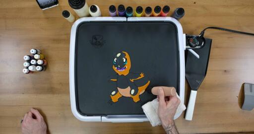Charmander Pancake Art step 5.3: For Charmander's belly and the underside of the tail, switch to your tan/light brown batter, to create contrast between Charmander's body and underside.