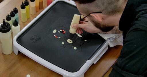 Squirtle Pancake Art step 3.2: Using your plain batter, add a slid oval highlight to Squirtle's chest.