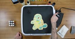 Squirtle Pancake Art step 7.1: Once your pancake design is all finished, you can turn your griddle n to about 225 degrees fahrenheit. Don't burn yourself! The surface with get hot soon, so be careful.