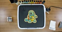 Squirtle Pancake Art step 8.3: ...And voila! You've flipped your Squirtle pancake! Look at how cute that is. Allow your design to cook on the reverse side for a moment, and then remember to turn your griddle off.