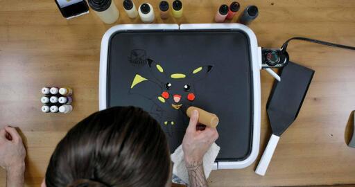 Pikachu Pancake Art step 5.1: Time to do the shading! Grab your darkest yellow batter (sort of a golden brown) and begin marking out the places where the light doesn't hit Pikachu as strongly. There's a patch under Pikachu's head...