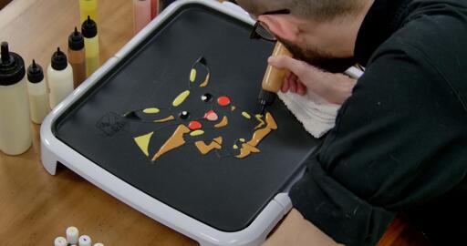 Pikachu Pancake Art step 5.3: ...and most of Pikachu's tail is in shadow, too. Once you've finished your highlights Pikachu ought to look a little bit like this.