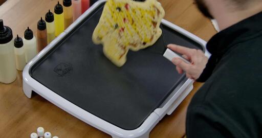 Pikachu Pancake Art step 9.2: ...turn it over gently and all at once...