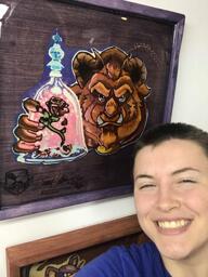Dana smiling with Preserved Pancake Art of The Beast