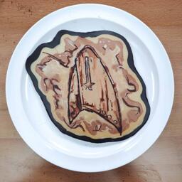 Pancake Art of a communicator badge from the TV show Star Trek Discovery